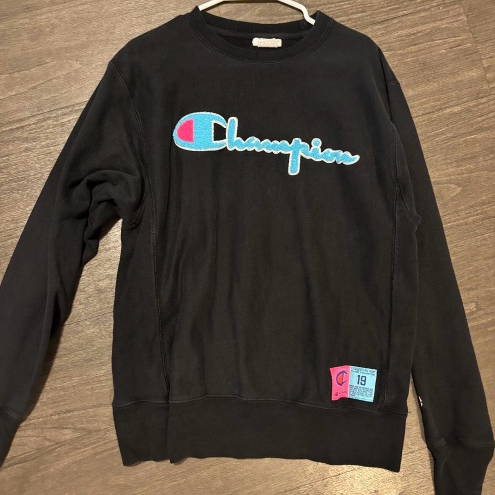 Champion Black Sweatshirt with Blue and Pink Logo